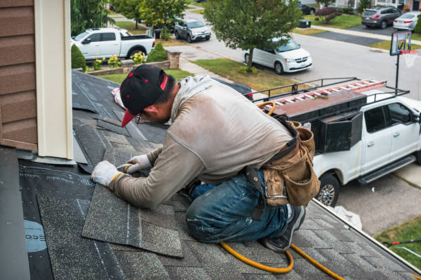 Professional Roofing technician working in Surfside, FL